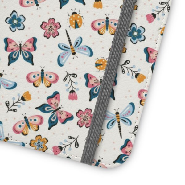 Closed, showing how flat strap is positioned across case of Butterfly All Over Print Faux Vegan Leather iPhone Flip Case